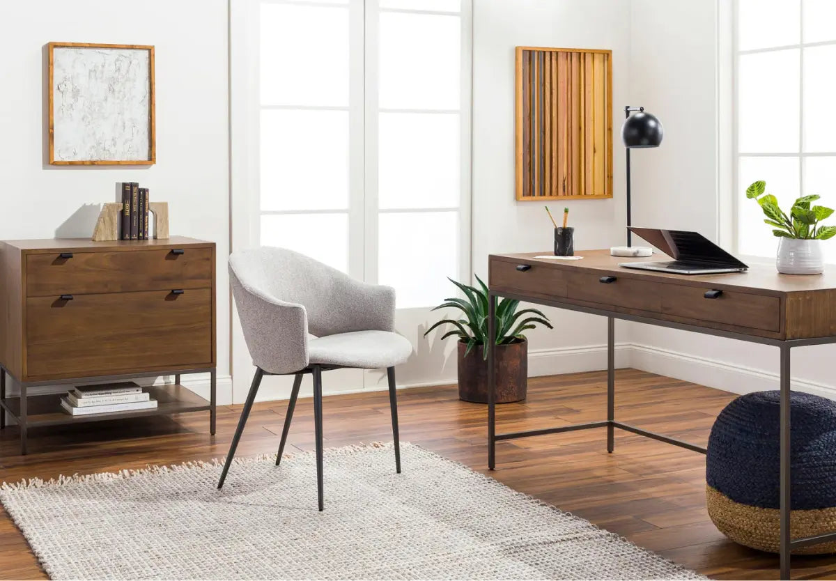 Modern home office with wooden desk, chair, and decor